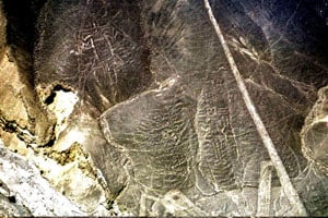 PARACAS GEOGLYPHS: Three figures made by the ancient Paracas culture can be seen outlined on the rocky hillsides near Palpa, southern Peru. The figures are known as the 